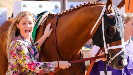 Field hockey alum Hannah Boyle with Whitmore at the 2017 Breeder's Cup