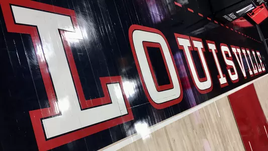 LOUISVILLE type on the end of the floor at the KFC Yum! Center