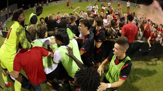 The Cardinals celebrate the game-winning goal against Bellarmine.