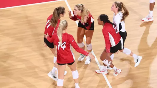 Cardinals celebrate on court against South Dakota