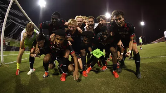 The cardinals celebrate after the win over Bellarmine.
