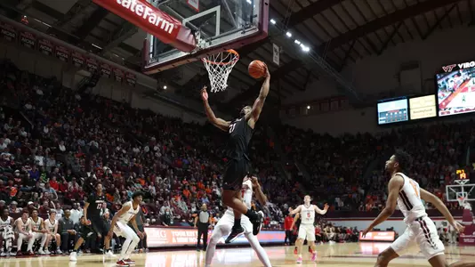 Sydney Curry dunks at Virginia Tech.