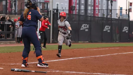 Alexander scores a run against Illinois