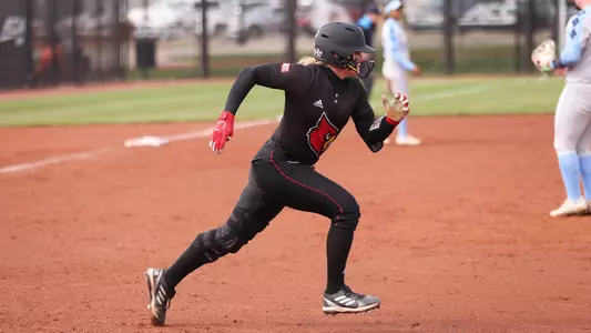 Hannah File runs to first base