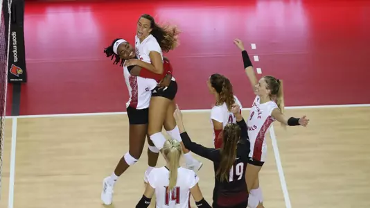 Amaya Tillman, Aiko Jones, and Co. celebrate a point. 