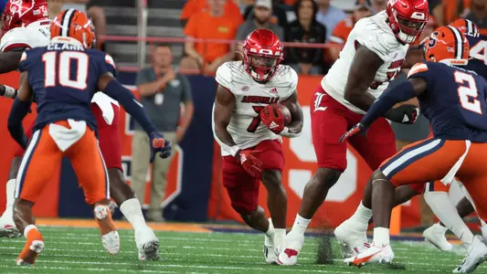 Tiyon Evans carries the ball at Syracuse.