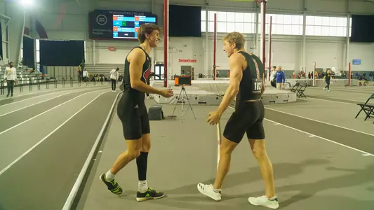 Cade DeWitt and Ty McPhail celebrate during the men's pole vault at the KTCCCA College Opener.