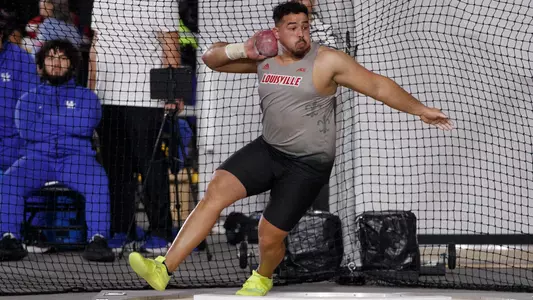 Jorge Contreras Nazario competes in the shot put at the Commonwealth College Opener