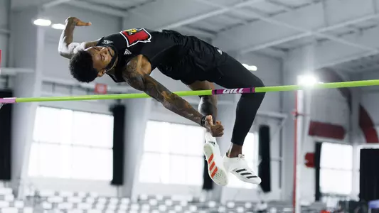 Trey Allen competes in the high jump at the Cardinal Classic