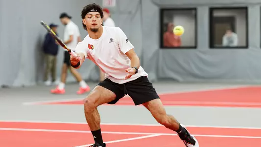 Matthew Fung returns the ball against Northwestern