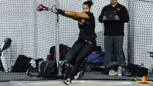 Zoe Yeast competes in the weight throw at the Cardinal Classic