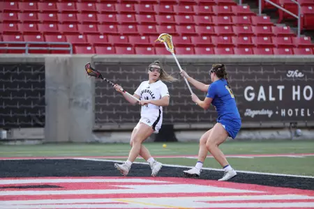 Hannah Morris battles a defender against Pitt