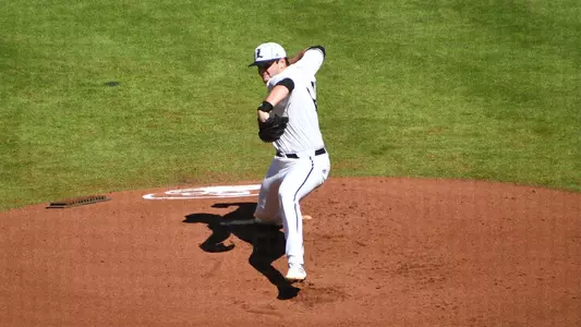 Carson Liggett pitching against Michigan in Houston.