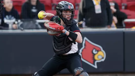 Catcher Sarah Gordon behind the plate against Northwestern