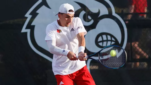 Etienne Donnet returns a ball in the match against Notre Dame