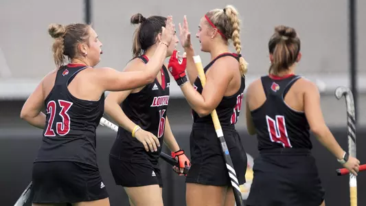 Louisville celebrates after a goal against Bellarmine