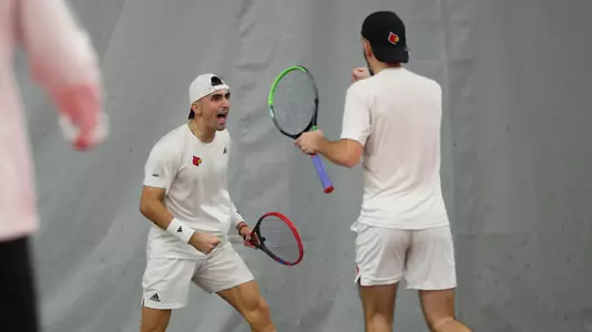 Etienne Donnet and Natan Rodrigues celebrate their doubles victory