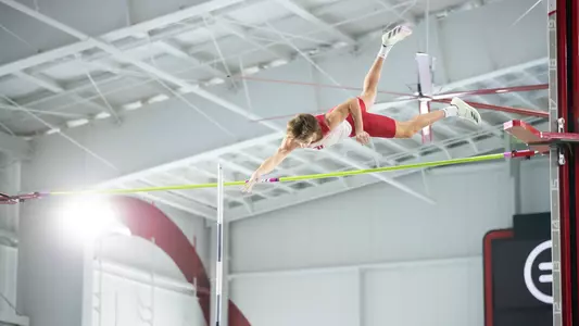 Cade DeWitt clears the bar in the men's pole vault at the PNC Lenny Lyles Invitational