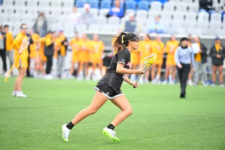 Negai Nakazawa runs with the ball against Pitt