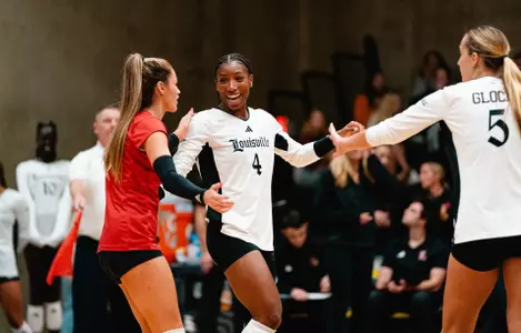 Charitie Luper and Elena Scott congratulate each other 