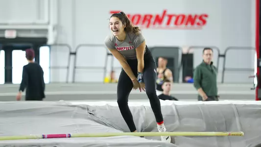 Natalie Lark celebrates after breaking the women's pole vault school record at the PNC Lenny Lyles Invitational.
