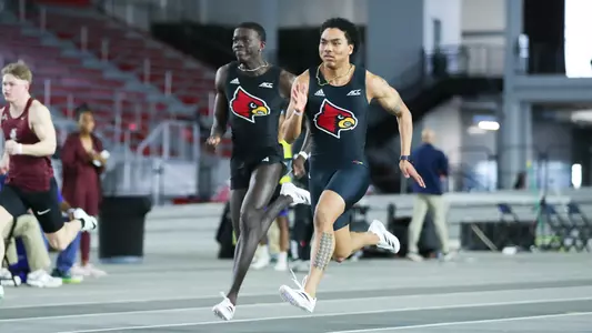 Jaidyn Johnson and Clarence McLean race to the line in the 60m at the 2025 Eastern Indoors.