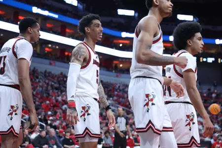 Terrence Edwards Jr. smiling at the team against California on March 5, 2025