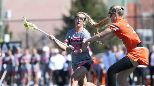 Lauren Figas with the ball against Virginia Tech