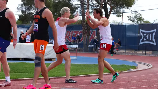 KJ Byrd and Paul Kallenberg celebrate with one another after the decathlon 100m at the 2025 Jim Click Shootout & Multis.