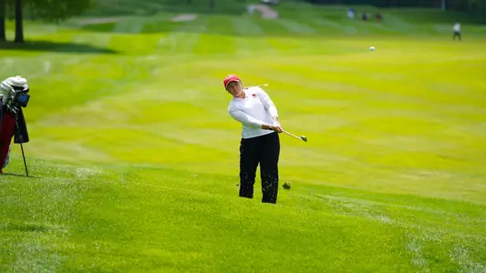Bailey Burkett hits an approach shot at NCAA Regional