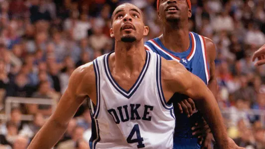 Former Duke forward Carlos Boozer gathering a rebound