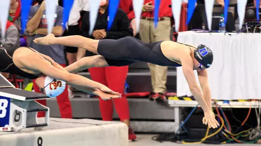 Alyssa Marsh dives into the pool