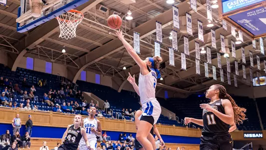 Haley Gorecki goes up for a layup against Alaska Anchorage