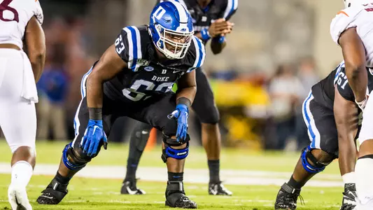 Jacob Monk defends the offensive line for Duke in a win over Virginia Tech.