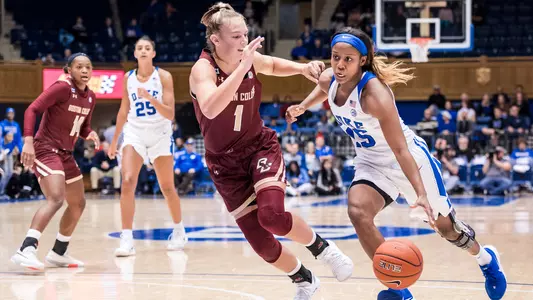 Kyra Lambert driving past a BC defender