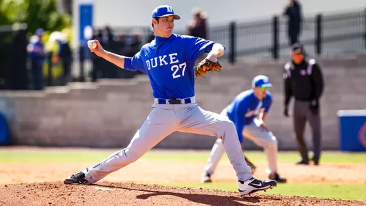 Duke alum James Marvel throws pitch from the stretch