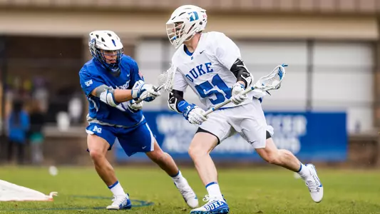 Dyson Williams dodges an Air Force defenseman