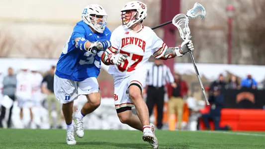 Tyler Carpenter defends a Denver Pioneer