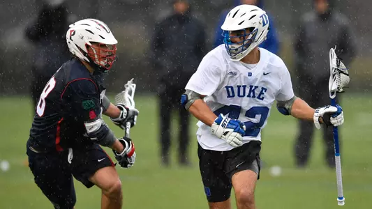 Reilly Walsh dodges a Penn defender