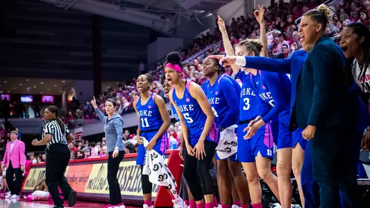 Duke bench fired up after a made three