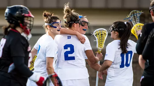 Katie Cronin and Caroline DeBellis celebrating after a goal