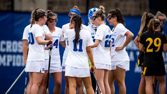 Duke women's lacrosse team huddle