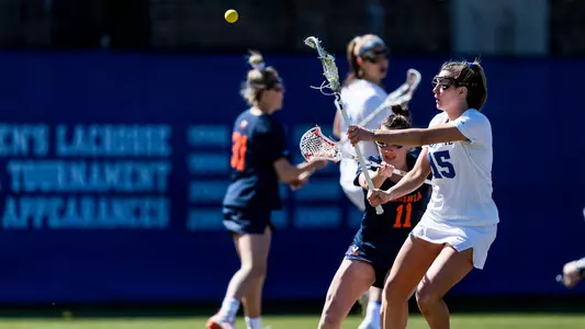 Abby Landry guarded by a Virginia defender