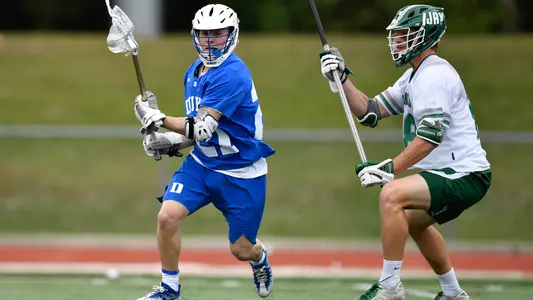 Cameron Mule dodges against a Jacksonville defenseman
