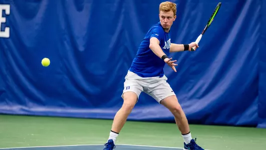 Luca Keist gets ready to hit the ball during Duke's match