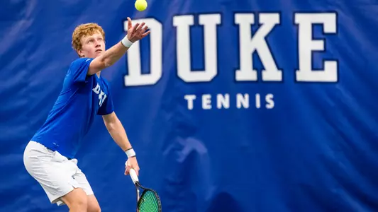 Luca Keist gets ready to serve against Liberty