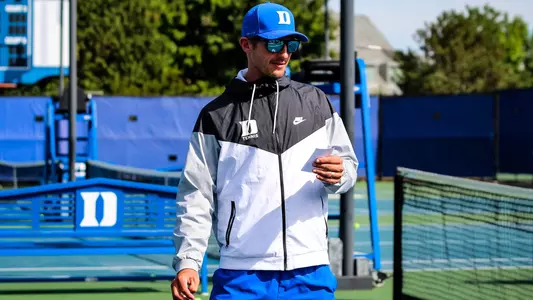 Duke men’s tennis head coach Ramsey Smith has announced the elevation of Maciek Sykut to associate head coach. 