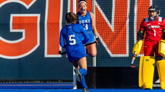 Hannah Miller celebrates a goal against Louisville