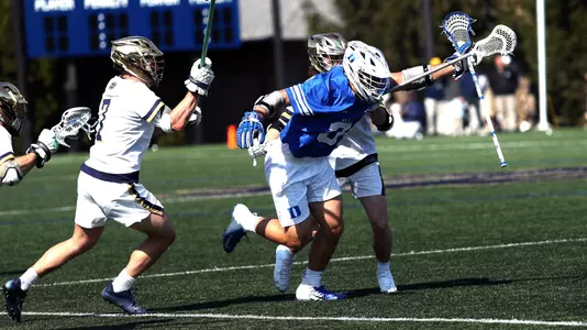 Charles Balsamo clears against Notre Dame men's lacrosse