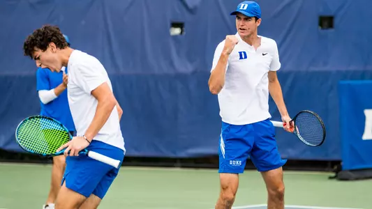 Connor Krug and Teddy Truwit celebrate after a doubles point